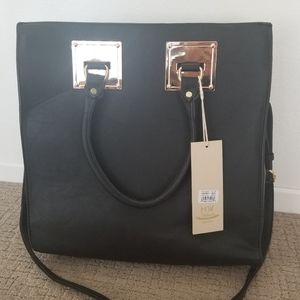 Madison West purse (*with slight denting)